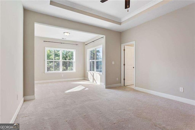 unfurnished bedroom featuring ceiling fan and light carpet