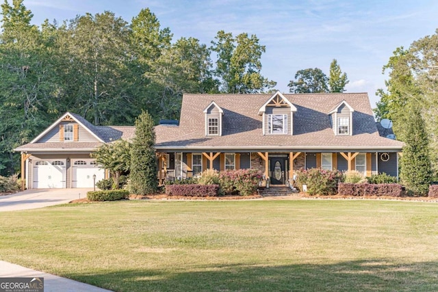 cape cod home featuring covered porch, a front yard, and a garage