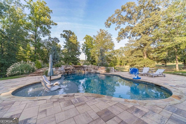 view of pool with a patio