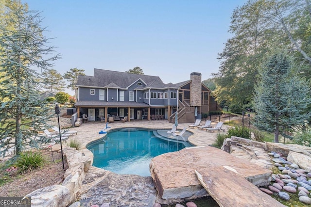 view of pool with a patio