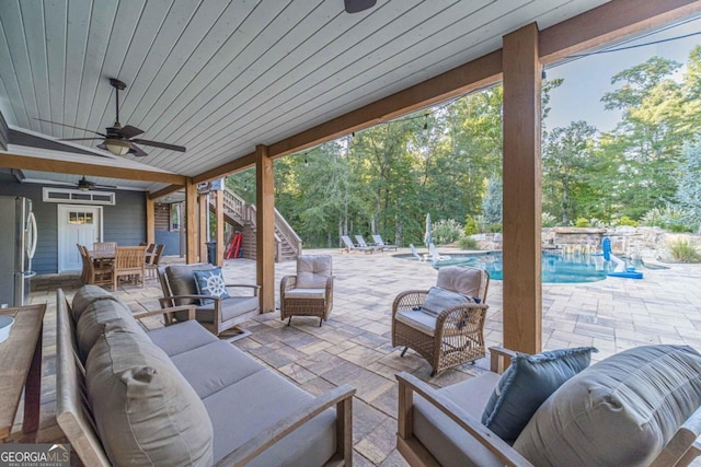 view of patio / terrace with outdoor lounge area and ceiling fan