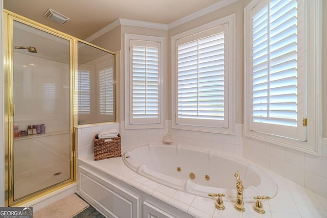 bathroom with ornamental molding and plus walk in shower