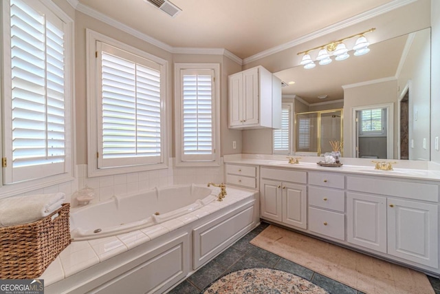 bathroom with tile patterned flooring, independent shower and bath, ornamental molding, and vanity