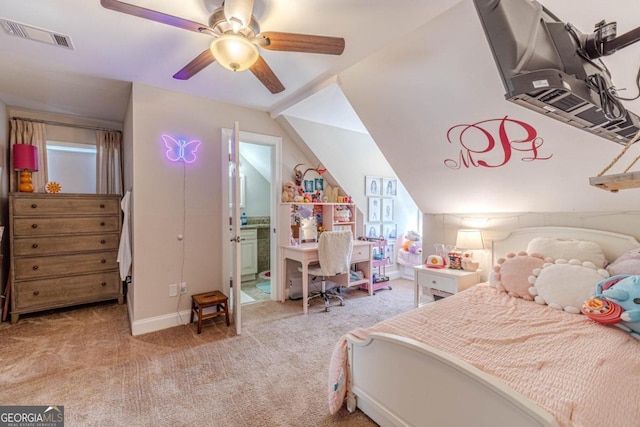 bedroom with ensuite bath, lofted ceiling, light colored carpet, and ceiling fan