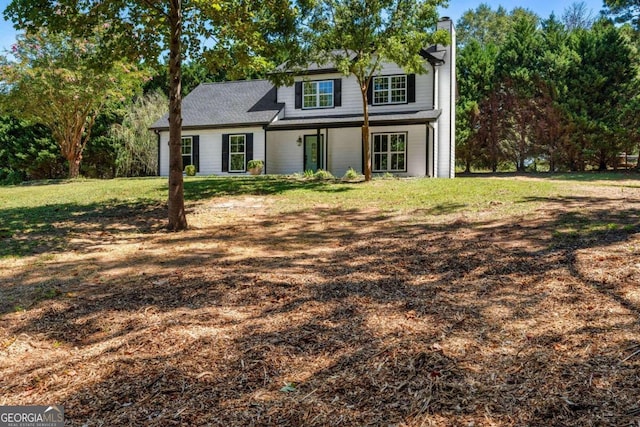 front facade with a front yard