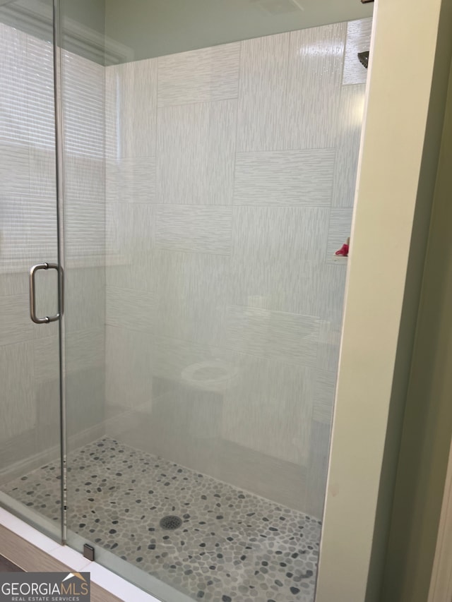 bathroom with walk in shower