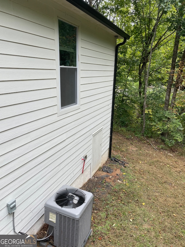 view of home's exterior featuring central AC