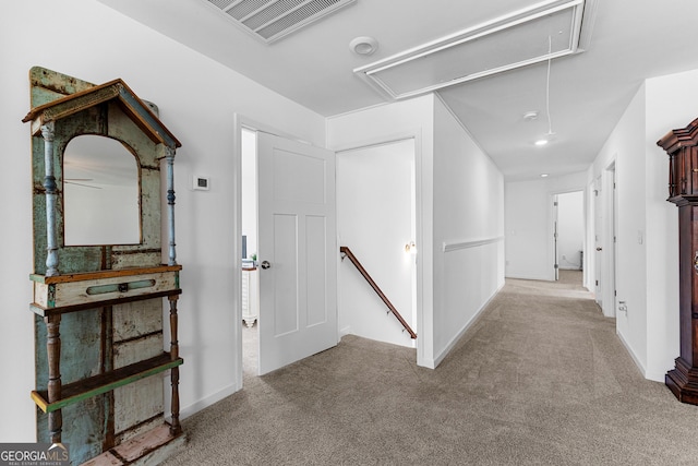 321 Brown Station Dr, Williamson, GA 30292 - corridor with baseboards, an upstairs landing, attic access, visible vents, and carpet