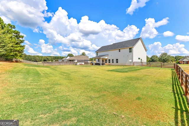 view of yard featuring a rural view