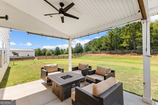 321 Brown Station Dr, Williamson, GA 30292 - view of patio / terrace with an outdoor living space with a fire pit, a rural view, a fenced backyard, and ceiling fan