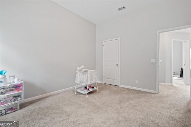 playroom featuring light carpet