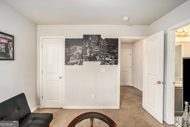 sitting room with carpet flooring