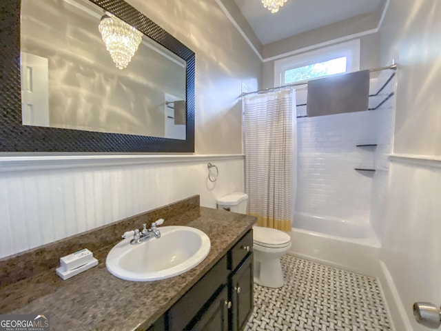 full bathroom with vanity, toilet, a notable chandelier, and shower / bathtub combination with curtain