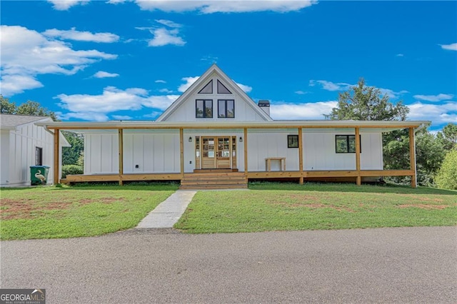 view of front facade featuring a front yard and a porch