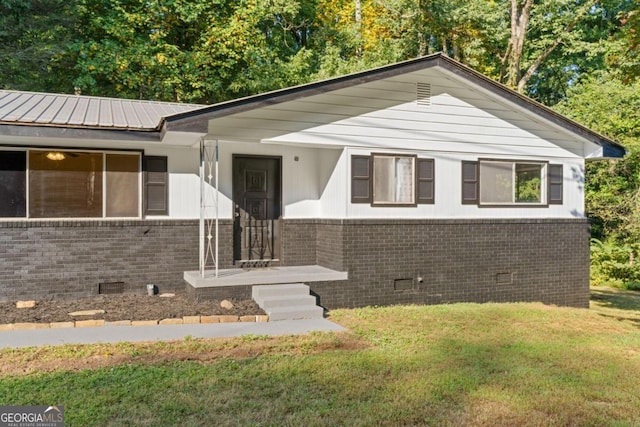 ranch-style house with a front yard