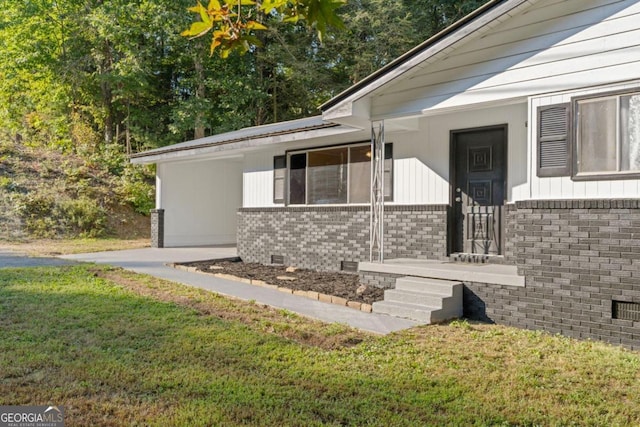 view of property exterior with a lawn