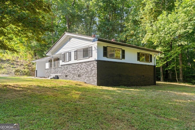 view of property exterior featuring a yard