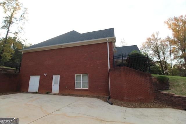 view of home's exterior with a patio area