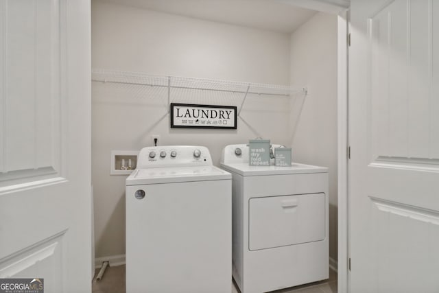 washroom featuring washing machine and dryer