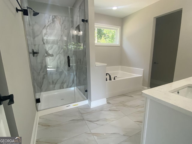 full bath with a marble finish shower, baseboards, marble finish floor, vanity, and a bath