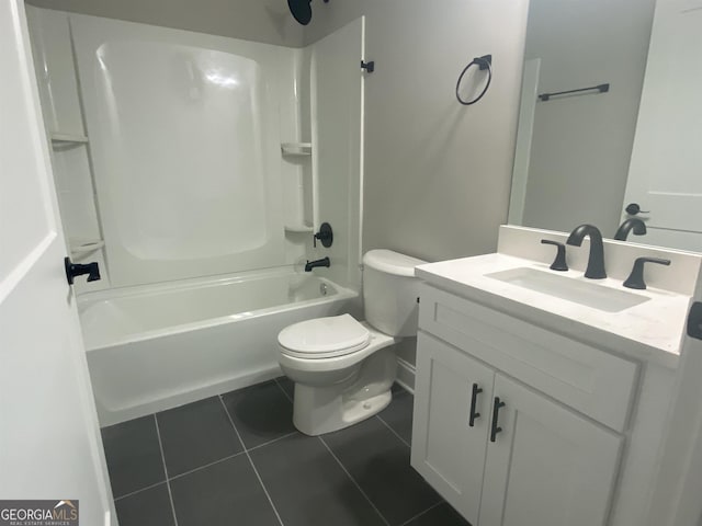 bathroom with vanity, shower / tub combination, tile patterned flooring, and toilet