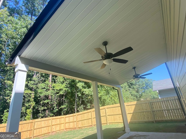 exterior space with ceiling fan and a patio