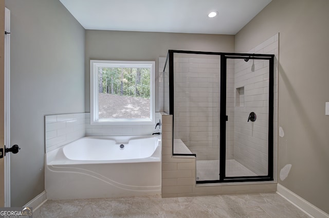 bathroom with plus walk in shower and tile patterned floors