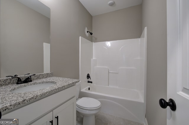 full bathroom with vanity, toilet, tile patterned floors, and tub / shower combination