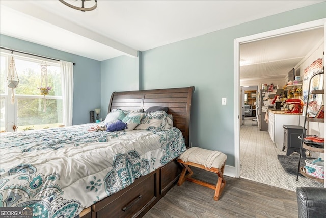 bedroom featuring dark hardwood / wood-style floors