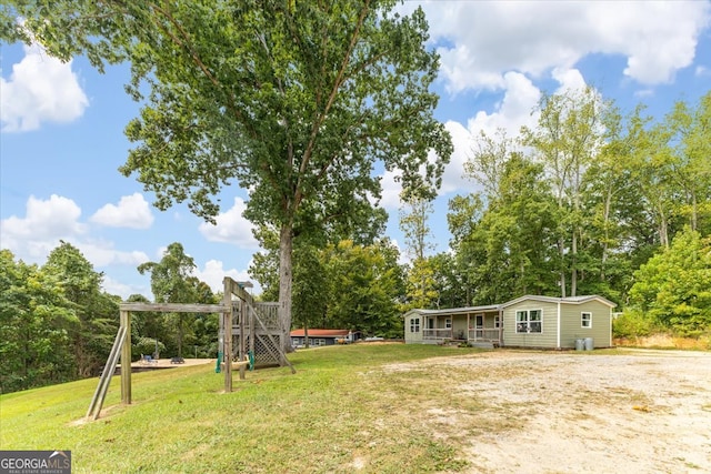 view of yard featuring a playground