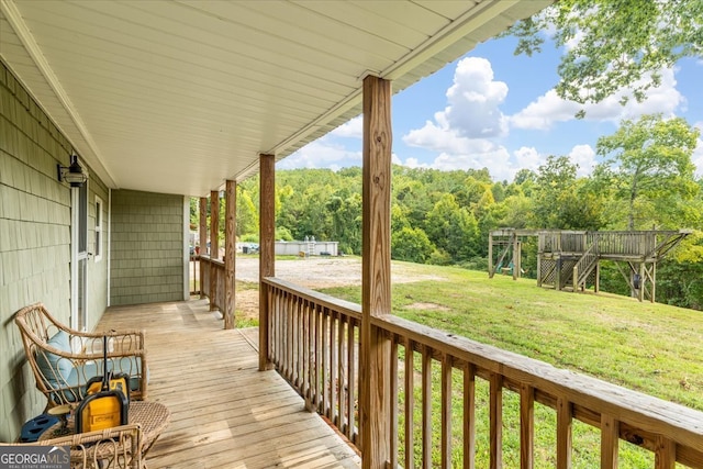 wooden deck with a yard