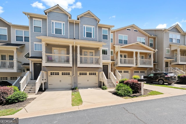 townhome / multi-family property featuring a garage