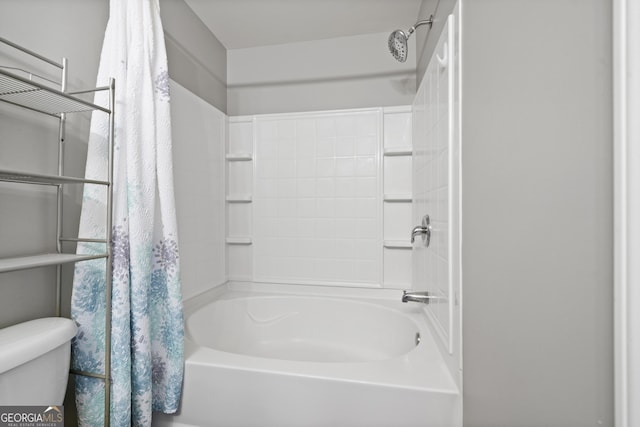 bathroom featuring toilet and shower / bathtub combination with curtain