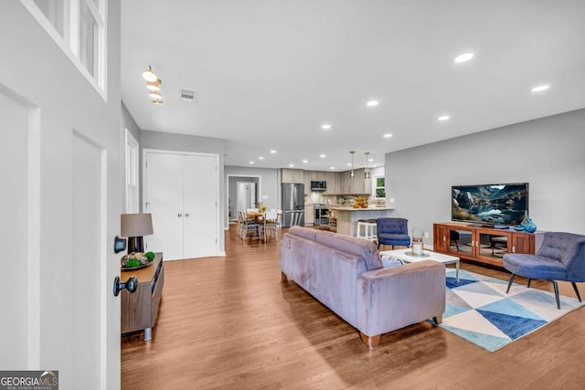 living room with light wood-type flooring