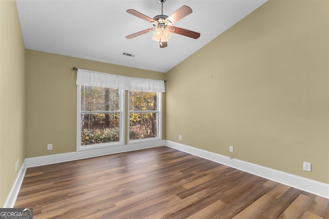 unfurnished room featuring ceiling fan, lofted ceiling, and hardwood / wood-style flooring