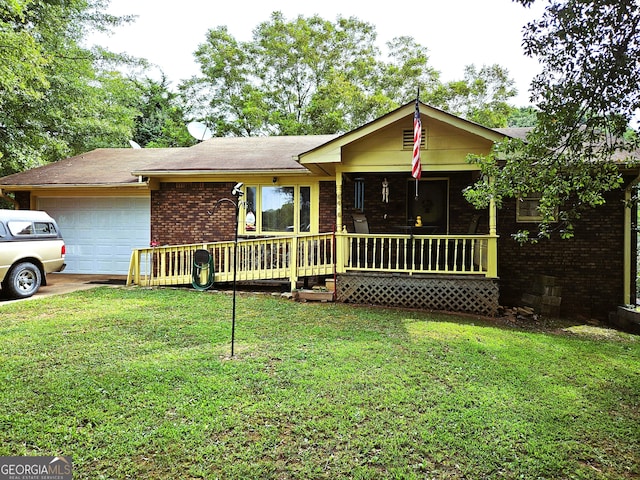 ranch-style house featuring a garage and a front yard