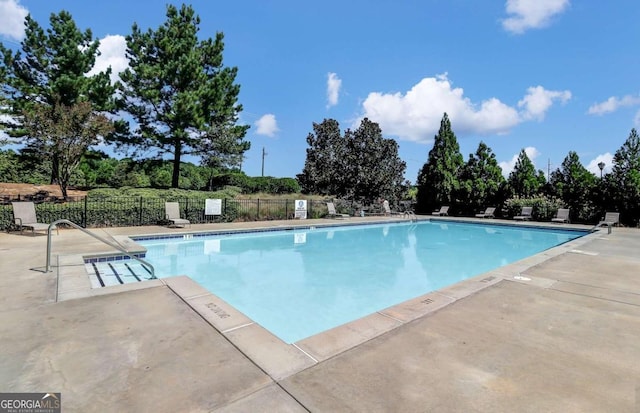 view of pool with a patio