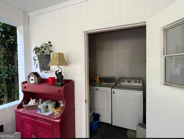 laundry room featuring washing machine and dryer