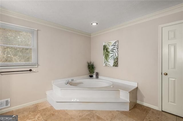 bathroom with ornamental molding, visible vents, and baseboards