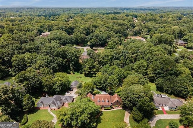 aerial view with a wooded view