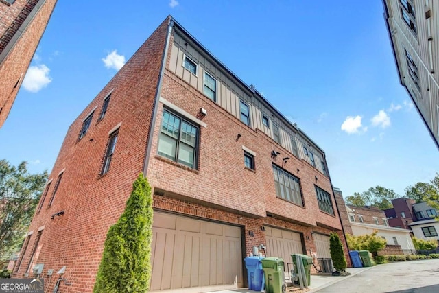 view of building exterior featuring a garage