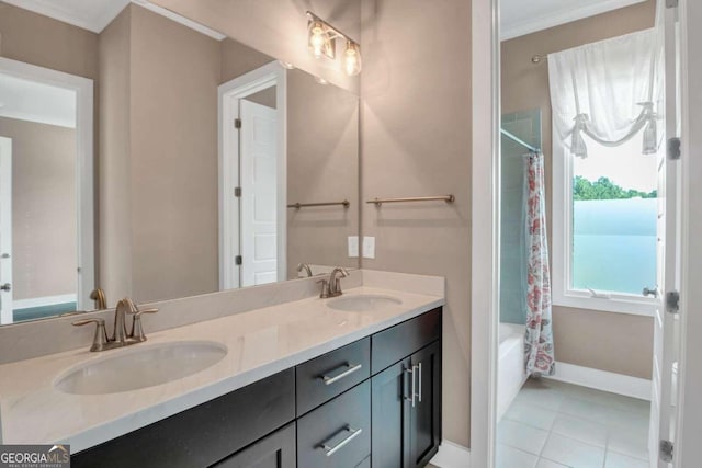 bathroom with ornamental molding, tile patterned flooring, vanity, and shower / bath combo with shower curtain