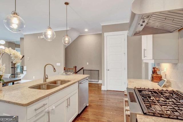 kitchen featuring sink, white cabinetry, exhaust hood, appliances with stainless steel finishes, and light stone countertops