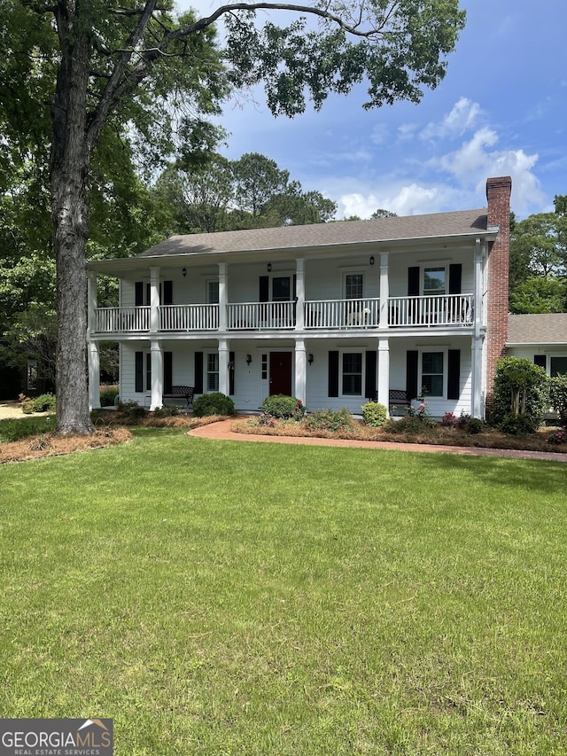 231 Parkview Dr, Cartersville, GA 30120 - view of front facade with a front yard and a chimney