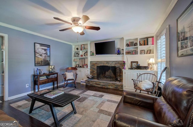 231 Parkview Dr, Cartersville, GA 30120 - living room featuring a ceiling fan, wood finished floors, built in features, baseboards, and ornamental molding