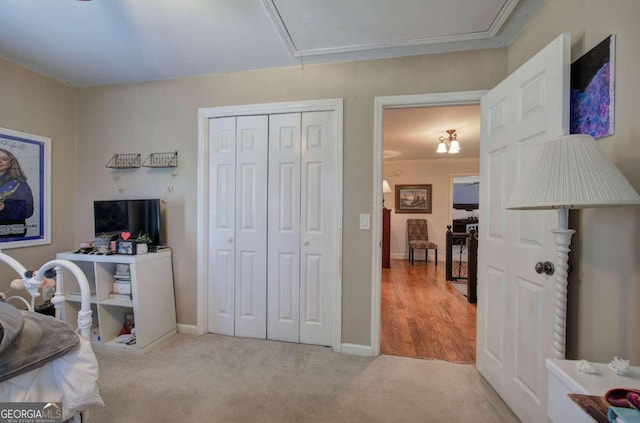 carpeted bedroom with a closet