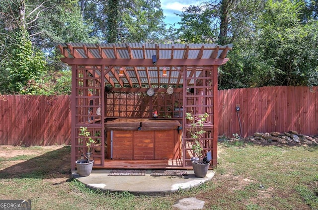 231 Parkview Dr, Cartersville, GA 30120 - view of outbuilding with a fenced backyard and a hot tub
