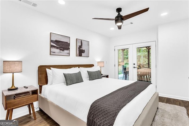 bedroom featuring ceiling fan, dark hardwood / wood-style floors, access to outside, and french doors