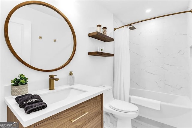 full bathroom featuring vanity, toilet, and shower / bath combination with curtain