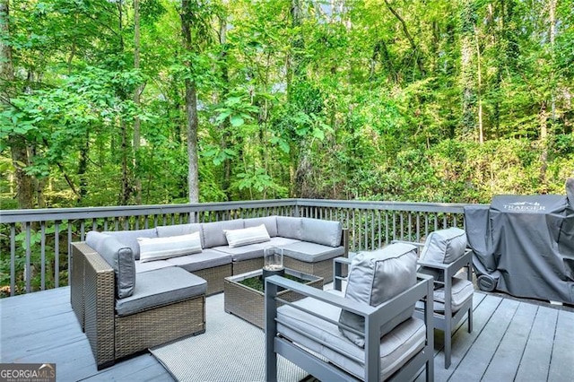 wooden terrace featuring an outdoor living space